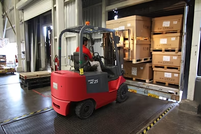 Forklift loading customer stock for delivery under a call-off arrangement
